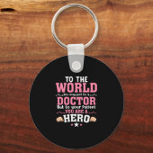 Voor de wereld kun je gewoon dokter worden. sleutelhanger (Voorkant)