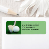 voor golfers golfbal en club op groen adres etiket (Insitu)