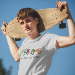 Voor Skateboarders Skateboarden Graphics Custom T-shirt<br><div class="desc">Creëer aangepaste uitrusting voor uw favoriete skater met dit skateboarden over het grafische t-shirt dat klaar is om gepersonaliseerd te worden met uw eigen bericht. Het bevat illustraties in de silhouetstijl van skateboarders in mosterdgeel, turkooisblauw, donkerrood, groen en roest sinaasappel. Jouw tekst wordt weergegeven onder de afbeelding in het laksteengrijze...</div>