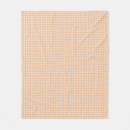 Vooraanzicht van een stof met een warme oranje  fleece deken