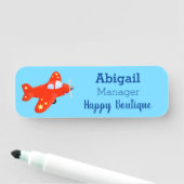 Voorbeeld van de cartoon van het rode luchtvliegtu naamplaatje (In situ)