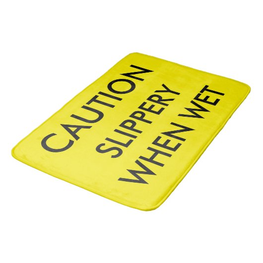Voorzichtig. Slipperig wanneer nat. Badmat (Gekanteld)