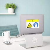 Voorzichtigheid/apparatuur begint automatisch met  sticker (Laptop op bureau)