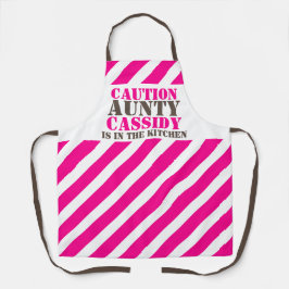 Voorzichtigheid in de keukenroze band schort