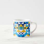 Vormen in een blauw-gele tongvormig naaldloos patr espresso kop (Rechts)