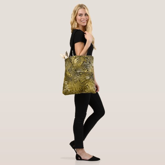 Vormt 'Gold'-afdrukken in de hele canvas tas (Op model)