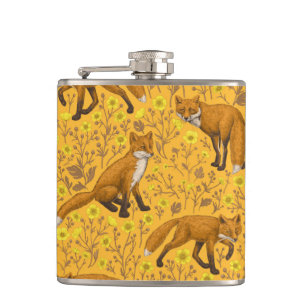 Vossen en boterbloemen op sinaasappel heupfles