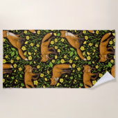 Vossen en boterbloemen op zwart strandlaken (Voorkant)