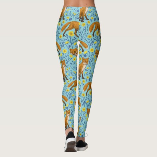 Vossen en boterbloemen op zwembad blauw leggings (Achterkant)