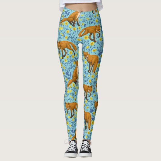 Vossen en boterbloemen op zwembad blauw leggings (Voorkant)