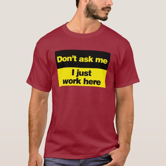 Vraag me niet dat ik hier gewoon werk. t-shirt (Voorkant)