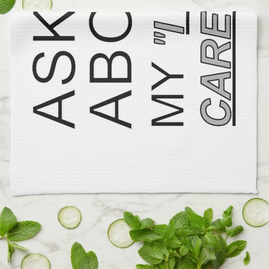 Vraag me wat ik niet kan schelen theedoek (Gevouwen)