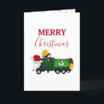 Vrachtwagen voor kerstrecycling van vuilnis feestdagen kaart<br><div class="desc">Een schattige illustratie van een vuilniswagen met kerstrecycleerbaarheid met een kersthoed en versierd in kerstverlichting met de woorden "Vrolijk kerstfeest". Een ideaal kerstkaartontwerp voor vuilnismannen,  grote of kleine meisjes of jongens.</div>
