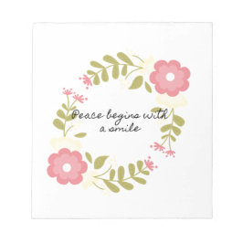 Vrede begint met een glimlach van roze en groene b notitieblok