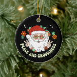 Vrede en Grooviness Hippie Santa Christmas Keramisch Ornament<br><div class="desc">Voeg een vleugje plezier en grilligheid toe aan uw kerstboom met dit hippie kerstmannetje "PEACE AND GROOVINESS" kerstornament.</div>