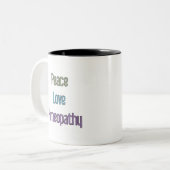 Vrede, liefde, Homeopathie Tweekleurige Koffiemok (Voorkant links)