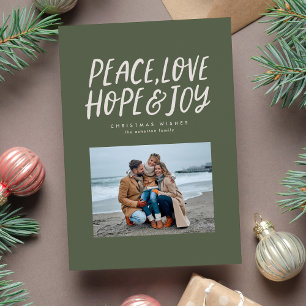 Vrede liefde hoop vreugde groene Kerstmis foto Feestdagenkaart