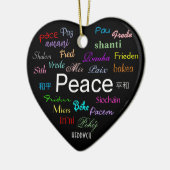 Vrede over de hele wereld in zwart keramisch ornament (Links)