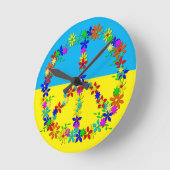 Vredesbord met bloemen, oekraïense vlag, wat ronde klok (Hoek)