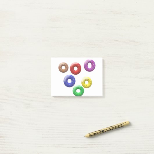 Vreemde gespikkelde donutvormen post-it® notes (Op bureau)