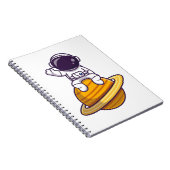 Vriendelijke astronaut zwaait van een planeet notitieboek (Rechterzijde)