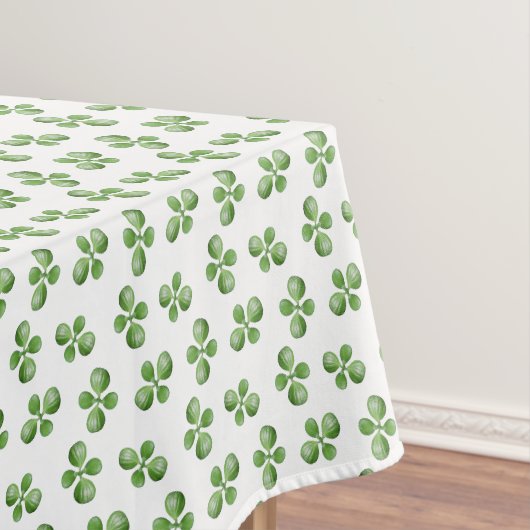 Vriendelijke groene succulente bladeren op wit tafelkleed (Voorbeeld)
