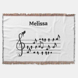 Vrij als vogel, zangvogels die als muzikale noten  deken