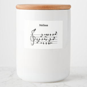 Vrij als vogel, zangvogels die als muzikale noten  voedselcontainer etiket