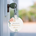 Vrijgezellenfeest roos goud florale eucalyptusvoor sleutelhanger<br><div class="desc">Een witte achtergrond. Gedecorbeerd met een roos goudkleurige,  wazige roze bloem (roos) en groene waterkleurde eucalyptusbladeren,  sprigs,  groen en een nepgoudbolletje. Pas de naam van de bruid aan en voeg deze toe. Zwarte en gouden letters. Perfect als een keepbehoeve en partijvoordeel.</div>