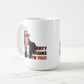 'Vrijheid begint met je' koffie-Mok Koffiemok (Voorkant links)