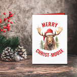 Vrolijk Christus-eland Grappige Kerstmis Moose Feestdagen Kaart<br><div class="desc">Omarm de vakantiedrang met onze charmante kerstkaart met een beminnelijke eland op de voorkant met een kerstmuts, vergezeld van de puntige begroeting "Merry Christ-moose". Binnenin vind je een hartverwarmend couplet dat de essentie van het seizoen vastlegt met een beetje een woordspeling ook. Deze kaart is perfect voor het sturen van...</div>