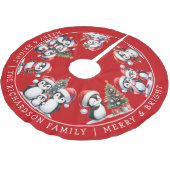 Vrolijk en helder familie kerstpinguïns in het roo kerstboom rok (Gekanteld)