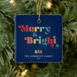 Vrolijk en kleurrijk kerstfeest keramisch ornament<br><div class="desc">Dit vierkante kerstboom ornament heeft de tekst "Merry & Bright" in een levendige,  retro stijl. De tekst valt op tegen een donkerblauwe achtergrond,  waardoor een visueel opvallend contrast ontstaat. Personaliseer dit retro thema ornament met jouw naam en jaar. Fotografie © Storytree Studios,  Stanford,  CA</div>