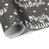 Vrolijk kerstbericht in sneeuwvlokken op rode vlok cadeaupapier (Rol Hoek)