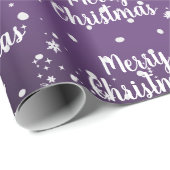 Vrolijk kerstbericht in sneeuwvlokken op rode vlok cadeaupapier (Rol Hoek)