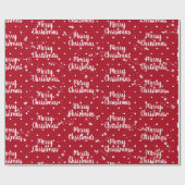 Vrolijk kerstbericht in sneeuwvlokken op rode vlok cadeaupapier (Vlak)