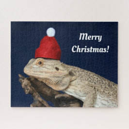 Vrolijk kerstcadeau met draak in een kersthat legpuzzel