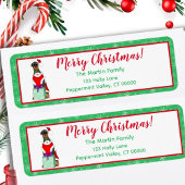 Vrolijk kerstcadeautje in kerstmis etiket