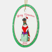 Vrolijk kerstcadeautje in kerstmis keramisch ornament (Links)