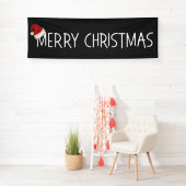 Vrolijk kerstcadeautje met kerstcadeautje op zwart spandoek (Insitu)