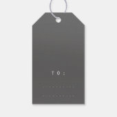 Vrolijk kerstcadeautje om gouden grijze grafiet te cadeaulabel (Achterkant)