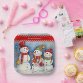 Vrolijk kerstfeest, drie kleurrijke sneeuwpoppen, papieren bordje (Feest)