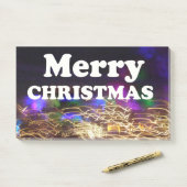 Vrolijk kerstfeest en een gelukkige nieuwjaarsgroe post-it® notes (Op bureau)