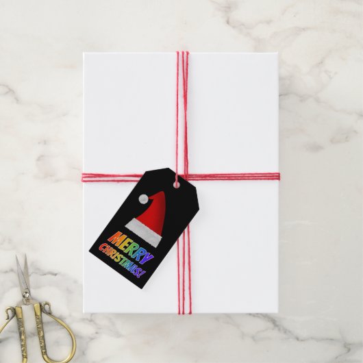 "VROLIJK KERSTFEEST!" in Rainbow Text, Red Santa H Cadeaulabel (Met Touw)