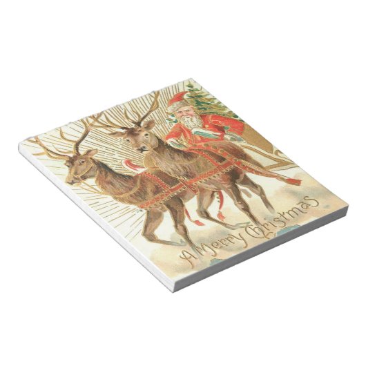 Vrolijk kerstfeest (kerstman en renrendiertje) notitieblok (Schuin)