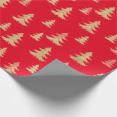 Vrolijk kerstfeest met gouden kerstbomen rood cadeaupapier (Hoek)