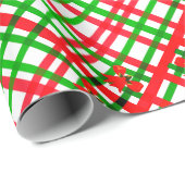 Vrolijk kerstfeest met rood en groen geblazen cadeaupapier (Rol Hoek)