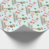 Vrolijk kerstfeest met snoeprietjes en linten cadeaupapier (Hoek)