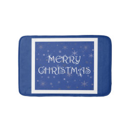 Vrolijk kerstfeest op blauw met sneeuwvlokken badmat