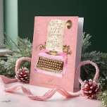 Vrolijk Kerstfeest Retro Roze Typemachine Santa Le Feestdagen Kaart<br><div class="desc">Vier het seizoen met een vleugje nostalgie door deze betoverende kerstkaart. Met onze handgeschilderde illustratie toont deze kaart onze charmante roze typemachine versierd met een stuk perkament met de feestelijke boodschap "Ho Ho Merry Christmas from the North Pole" in het klassieke script. Het exterieurontwerp roept een tijdloze vakantiegeest op, perfect...</div>